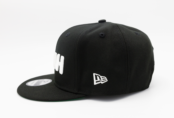 Side view of the TEAMWORKS NAHH New Era 9FIFTY Snapback featuring authentic New Era construction.